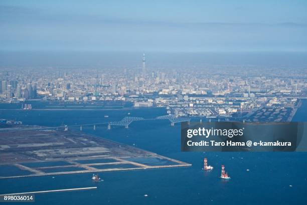 tokyo sky tree, tokyo gate bridge and tokyo bay in japan daytime aerial view from airplane - 東京湾 ストックフォトと画像
