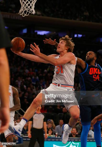 Ron Baker of the New York Knicks in action against the Oklahoma City Thunder at Madison Square Garden on December 16, 2017 in New York City. The...