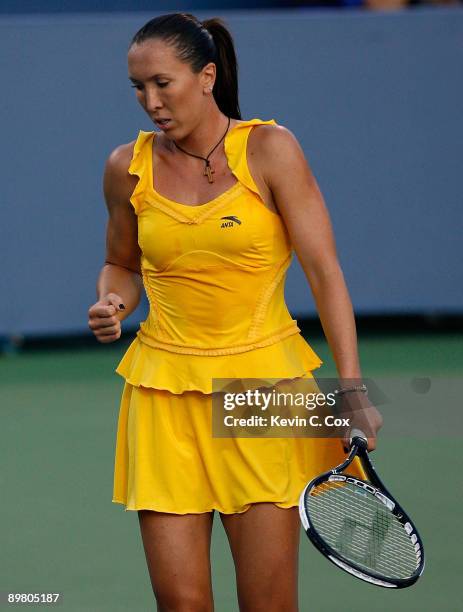 Jelena Jankovic of Serbia reacts after winning a point against Sybille Bammer of Austria during Day 5 of the Western & Southern Financial Group...