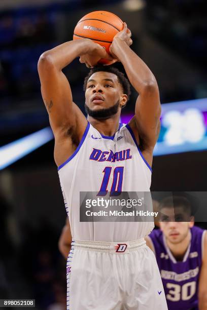 Tre'Darius McCallum of the DePaul Blue Demons shoots a free throw during the game against the Northwestern Wildcats at Wintrust Arena on December 16,...