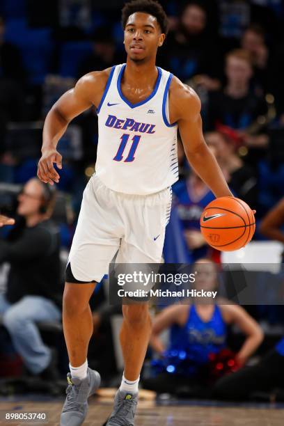 Eli Cain of the DePaul Blue Demons brings the ball up court during the game against the Northwestern Wildcats at Wintrust Arena on December 16, 2017...