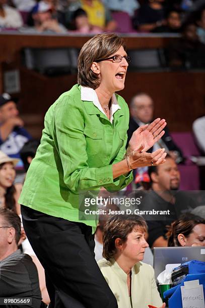 Head coach Anne Donovan of the New York Liberty applauds her team during action against the Chicago Sky on August 14, 2009 at Madison Square Garden...