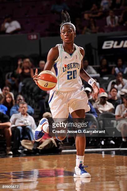 Shameka Christon of the New York Liberty moves the ball upcourt against the Chicago Sky on August 14, 2009 at Madison Square Garden in New York City....