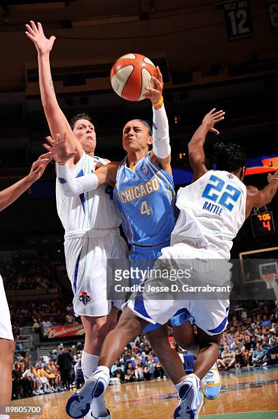 Candice Dupree of the Chicago Sky goes up for a shot against Janel McCarville of the New York Liberty on August 14, 2009 at Madison Square Garden in...