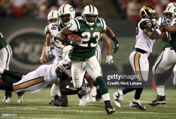 Shonn Greene of the New York Jets rushes against the St. Louis Rams during their preseason game at Giants Stadium on August 14, 2009 in East...