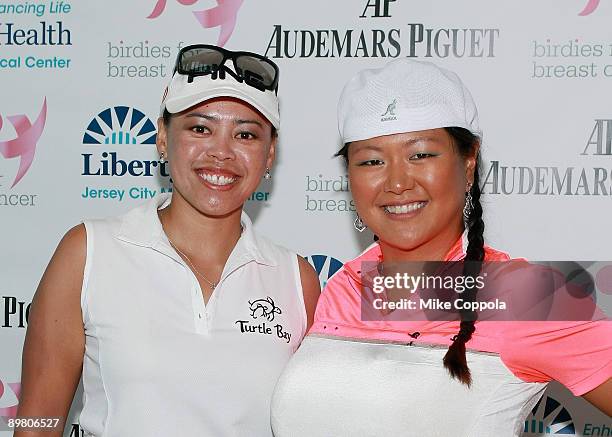 Professional golfers Dorothy Delasin and Christina Kim attend the 5th Annual "Birdies for Breast Cancer" charity golf classic at the Liberty National...