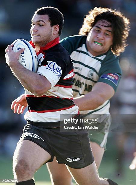 Mark Porpigkia of West Harbour runs the ball during the round 20 Shute Shield match between Warringah and West Harbour on at Pittwater Rugby Park on...