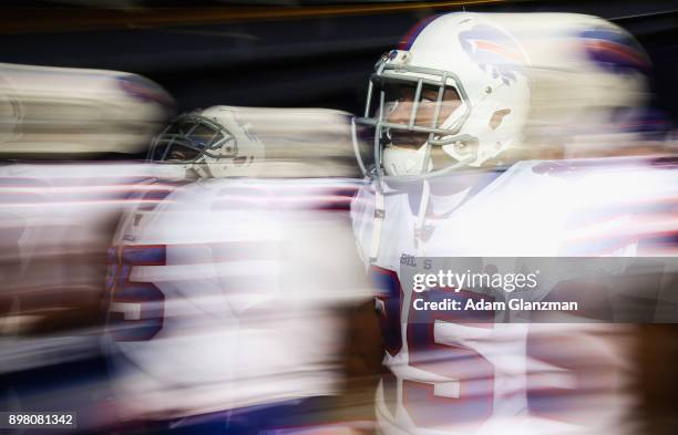 Mike Tolbert of the Buffalo Bills walks through the tunnel before a game against the New England Patriots at Gillette Stadium on December 24, 2017 in...