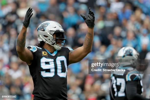 Julius Peppers of the Carolina Panthers reacts after a play against the Tampa Bay Buccaneers in the first quarter during their game at Bank of...