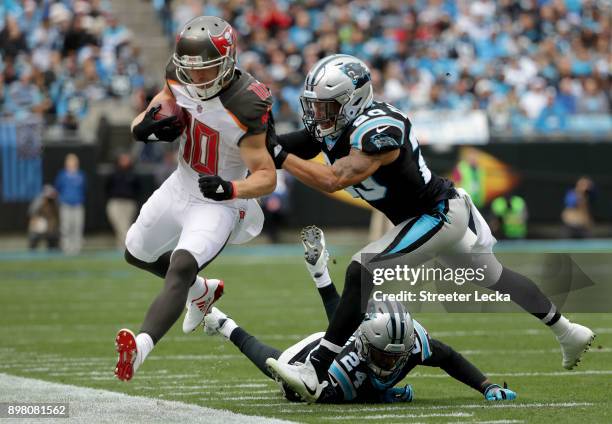 Kurt Coleman of the Carolina Panthers pushes Adam Humphries of the Tampa Bay Buccaneers out of bounds in the first quarter during their game at Bank...