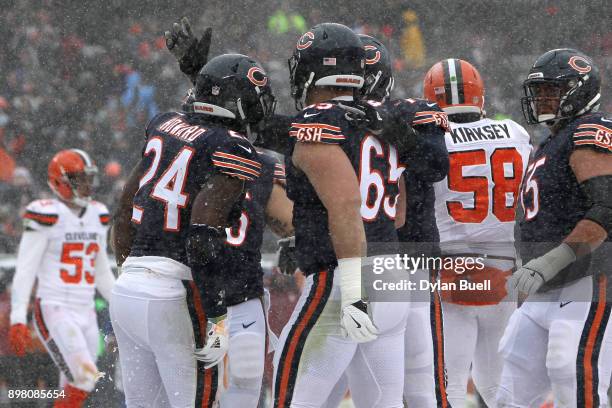 Jordan Howard of the Chicago Bears celebrates with teammates after scoring against the Cleveland Browns in the first quarter at Soldier Field on...