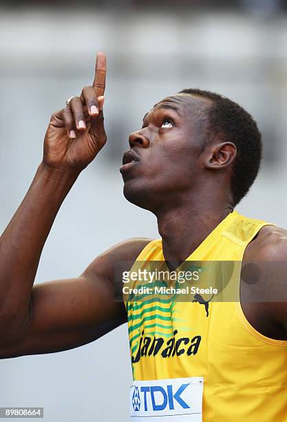 Usain Bolt of Jamaica competes in the men's 100 Metres Heats during day one of the 12th IAAF World Athletics Championships at the Olympic Stadium on...