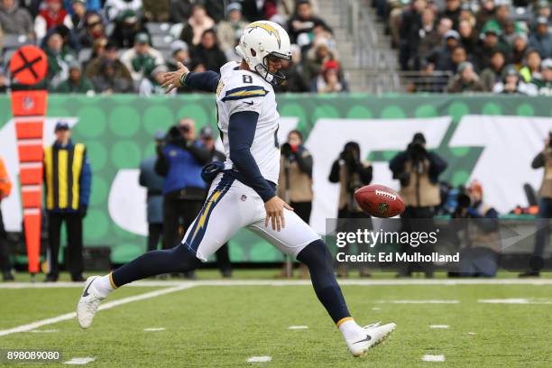 Drew Kaser of the Los Angeles Chargers punts the ball during the first half against the New York Jets in an NFL game at MetLife Stadium on December...