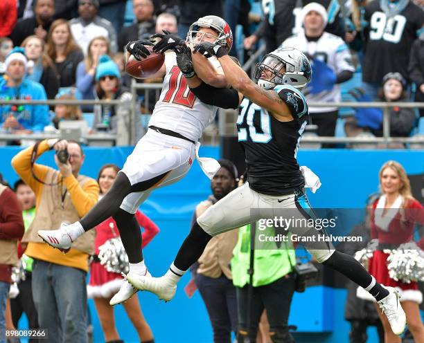 Adam Humphries of the Tampa Bay Buccaneers makes a catch against Kurt Coleman of the Carolina Panthers during their game at Bank of America Stadium...