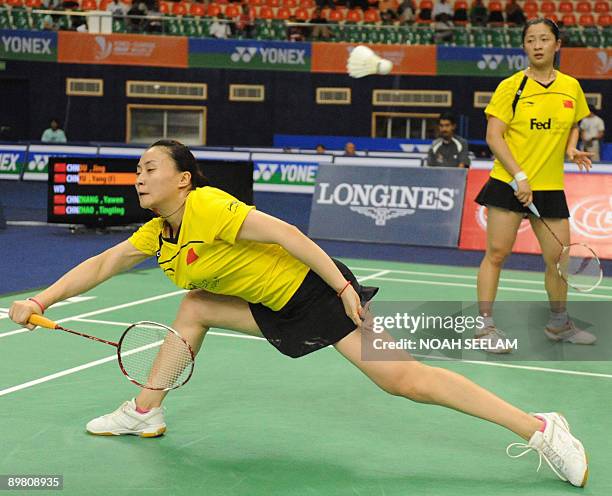 China's Zhang Yawen and Tao Tinting return a shot against compatriots Du Jing and Yu Yang during their women's doubles semifinals match of the World...