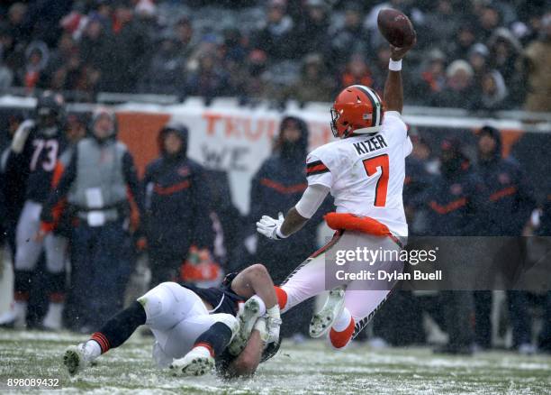 Nick Kwiatkoski of the Chicago Bears hits quarterback DeShone Kizer of the Cleveland Browns in the second quarter at Soldier Field on December 24,...