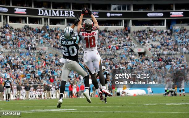 Adam Humphries of the Tampa Bay Buccaneers catches a pass against Kurt Coleman of the Carolina Panthers in the second quarter during their game at...