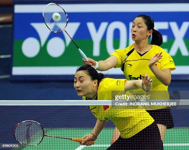 Zhang Yawen and Zhao Tingting of China play against compatriots Du Jing and Yang Yu during the women's doubles semi final match of the World...