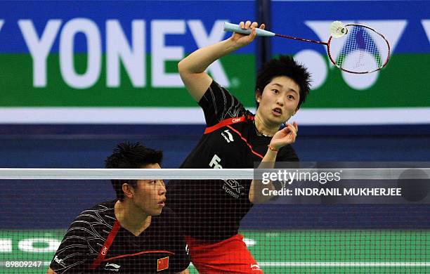 Du Jing and Yu Yang of china play against compatriots Zhang Yawen and Zhao Tingting during the women's doubles semi final match of the World...