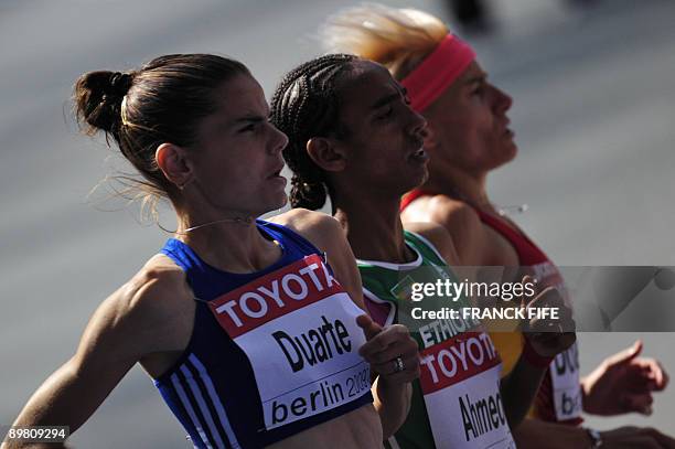 France's Sophie Duarte, Ethiopia's Zemzem Ahmed and Spain's Marta Dominguez compete in the women's 3000m steeplechase round 1 race of the 2009 IAAF...