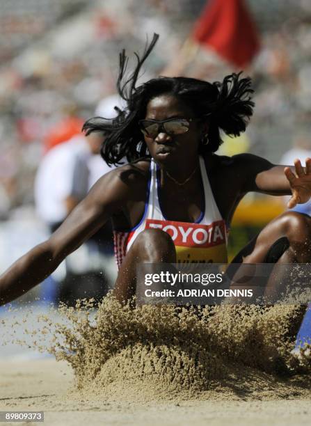 Cuba's Yargelis Savigne competes in the women's triple jump qualifying event of the 2009 IAAF Athletics World Championships on August 15, 2009 in...