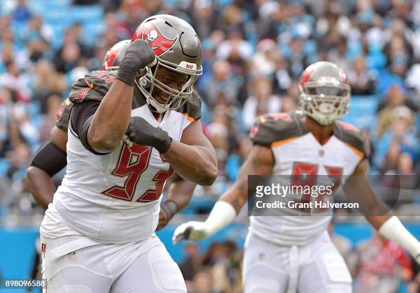 Gerald McCoy of the Tampa Bay Buccaneers reacts after scaking Cam Newton of the Carolina Panthers during their game at Bank of America Stadium on...