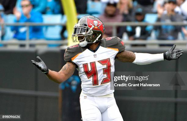 Ward of the Tampa Bay Buccaneers reacts after a play against the Carolina Panthers in the first quarter at Bank of America Stadium on December 24,...