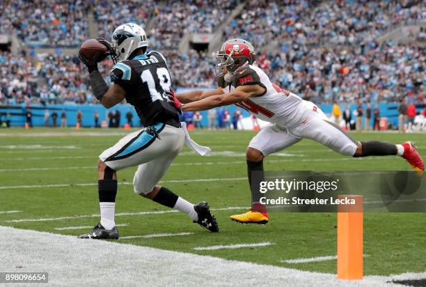 Brent Grimes of the Tampa Bay Buccaneers defends a pass to Damiere Byrd of the Carolina Panthers in the second quarter during their game at Bank of...