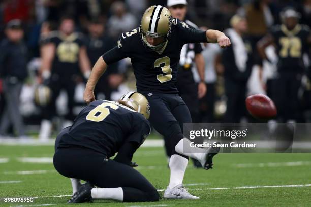 Wil Lutz of the New Orleans Saints kicks a field goal during the first half of a game against the Atlanta Falcons at the Mercedes-Benz Superdome on...