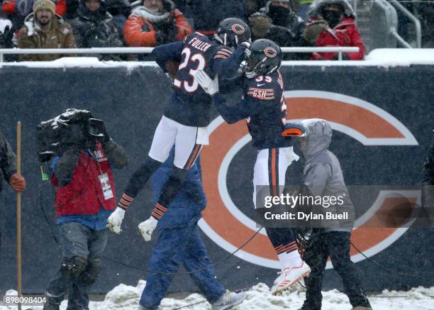 Kyle Fuller and Eddie Jackson of the Chicago Bears celebrate after Fuller intercepted the football in the second quarter against the Cleveland Browns...