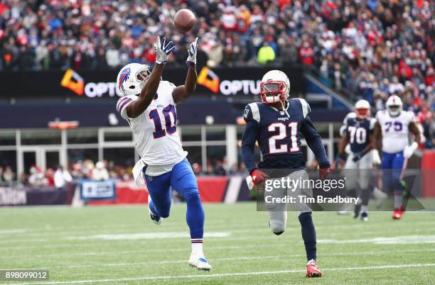 Deonte Thompson of the Buffalo Bills catches a pass as he is defended by Malcolm Butler of the New England Patriots during the second quarter of a...