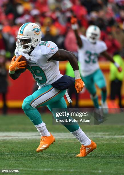 Wide receiver Jakeem Grant of the Miami Dolphins runs on his way to a touchdown during the second quarter of the game against the Kansas City Chiefs...