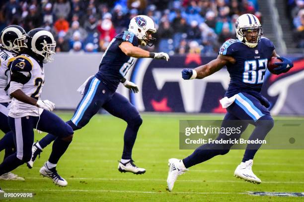 Tight End Delanie Walker of the Tennessee Titans carries the ball against the Los Angeles Rams at Nissan Stadium on December 24, 2017 in Nashville,...
