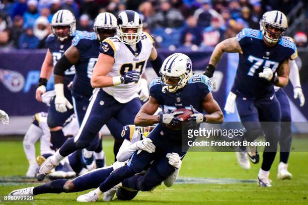 Wide Receiver Corey Davis of the Tennessee Titans carries the ball against the Los Angeles Rams at Nissan Stadium on December 24, 2017 in Nashville,...