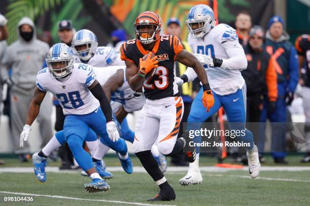 Brian Hill of the Cincinnati Bengals runs with the ball against the Detroit Lions during the second half at Paul Brown Stadium on December 24, 2017...