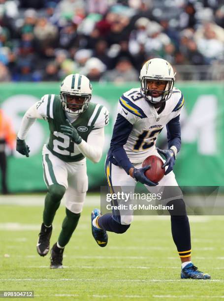 Keenan Allen of the Los Angeles Chargers is pursued by Morris Claiborne of the New York Jets during the second half of an NFL game at MetLife Stadium...