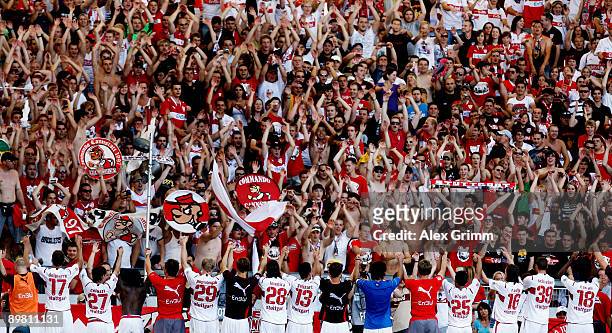 Players of Stuttgart celebrate with their supporters after the Bundesliga Match between VfB Stuttgart and SC Freiburg at the Mercedes-Benz Arena on...