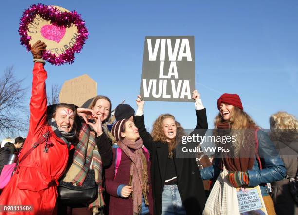 People take part in rally held in solidarity with the upcoming Women's March in a show of support for equal rights on January 21, 2017 in front of...