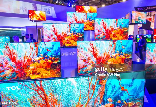 The TCL booth at the CES show in Las Vegas , CES is the world's leading consumer-electronics show..