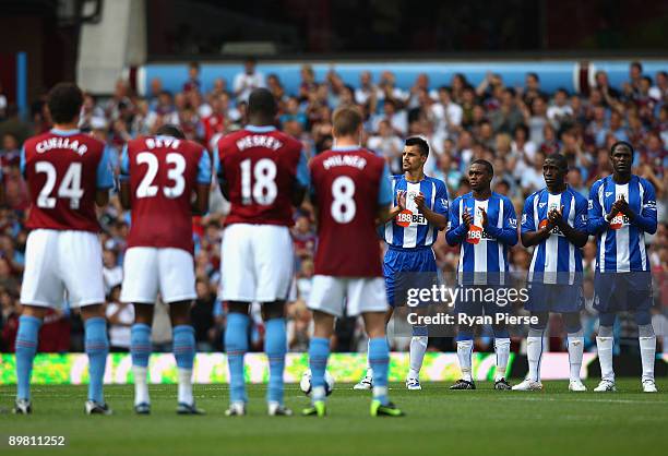 Aston Villa and Wigan plays pay tribute to Bobby Robson with a minutes applause before the Barclays Premier League match between Aston Villa and...