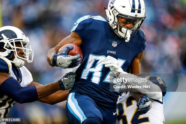 Wide Receiver Corey Davis of the Tennessee Titans carries the ball against the Los Angeles Rams at Nissan Stadium on December 24, 2017 in Nashville,...