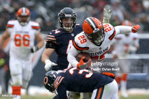 Bryce Callahan of the Chicago Bears hits Duke Johnson of the Cleveland Browns in the third quarter at Soldier Field on December 24, 2017 in Chicago,...