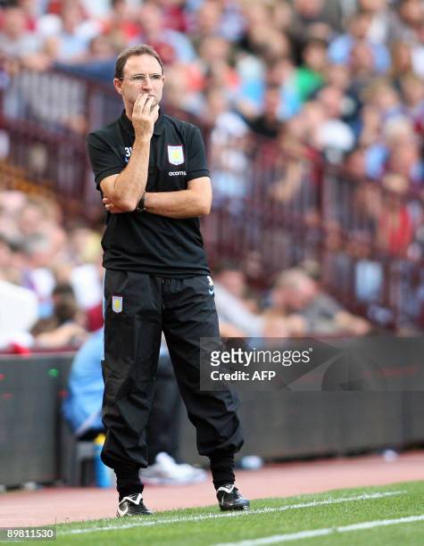 Aston Villa's manager Martin O'Neill watches from the side during the Premier League football match between Aston Villa and Wigan Athletic at Villa...