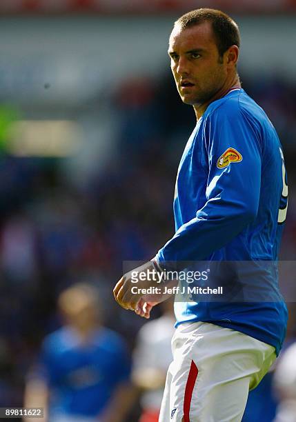 Kris Boyd of Rangers in action during the Scottish Premier League match between Rangers and Falkirk at Ibrox Stadium on August 15, 2009 in Glasgow,...