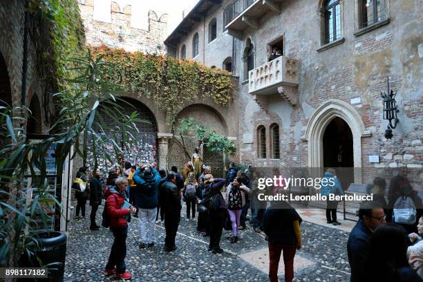 Tourists visit the courtyard of Via Cappello 23, which is today known as “Juliet’s House” on November 20, 2017 in Verona, Italy. The story of the...