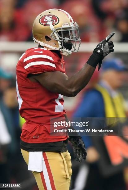 Aldrick Robinson of the San Francisco 49ers signals first down after catching a pass against the Jacksonville Jaguars during their NFL football game...