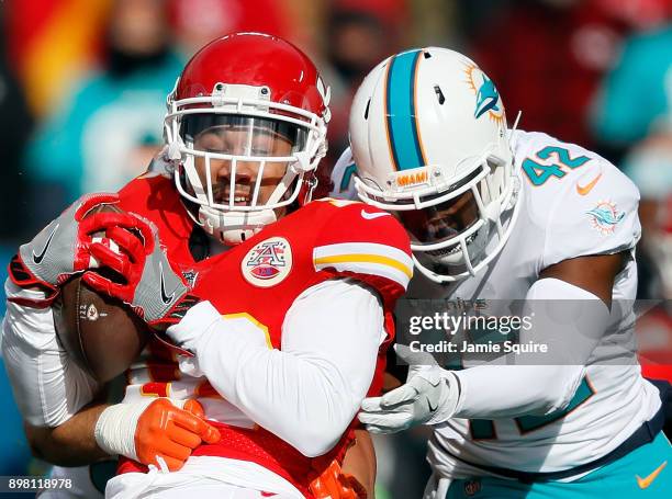 Wide receiver Albert Wilson of the Kansas City Chiefs makes a catch as defensive back Alterraun Verner of the Miami Dolphins defends during the game...