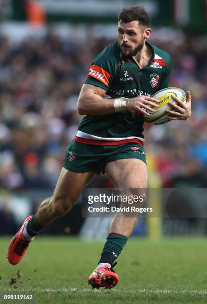 Adam Thompstone of Leicester runs with the ball during the Aviva Premiership match between Leicester Tigers and Saracens at Welford Road on December...
