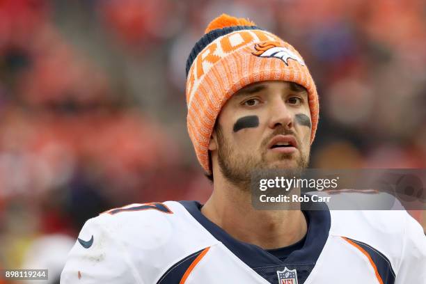 Quarterback Brock Osweiler of the Denver Broncos looks on late in the fourth quarter of the Broncos 27-11 loss to the Washington Redskins at...