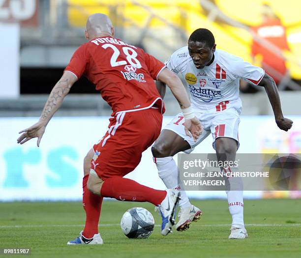 Nancy's forward Paul Alo'o Efoulou fights for the ball with Monaco's defender Sebastien Puygrenier during their French L1 football match at Marcel...